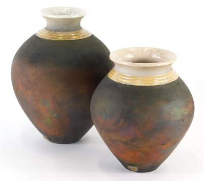 A graduated pair of 20thC Eleanor Newhall Cornish Studio pottery vases, each of tapering circular form, with raku glaze cream necks and matt bodies, 22cm high, etc. (2) - 3