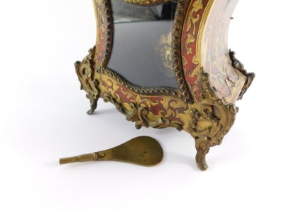 A French late 19thC Boulle mantel clock, the circular dial enamel dial signed Bright a Paris, and bearing Roman numerals, with Japy eight day movement striking on a bell, the case of balloon form, with pendulum and key, 31cm high, 16cm wide, 9cm deep. - 8