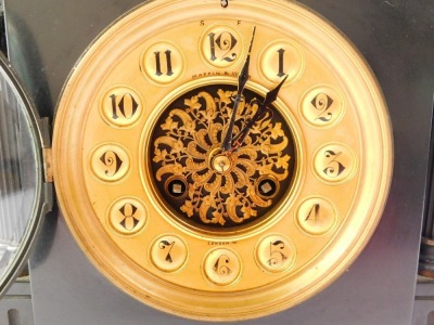 A late 19thC French slate and brass mantel clock, for Mappin & Webb, London, circular brass dial with central filigree scroll decoration, bearing Arabic numerals, eight day movement with coil strike, the case of architectural temple form with decorative f - 7