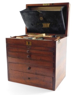 A Victorian mahogany dentist's chest by C Ash Sons & Company Ltd, London, the hinged lid with brass carrying handle, opening to reveal a fitted interior, with ointments and sundries, above five graduated drawers containing various instruments, 35cm high, - 4