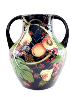 A Moorcroft pottery vase decorated in the Queen's Choice pattern, of Portland vase form, c2000, painted and impressed marks, 26cm high. - 5