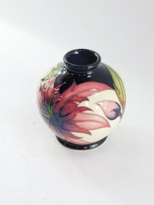 A Moorcroft pottery vase, designed by Rachel Bishop, limited edition 4/30, c2009, decorated with flowers against a cream ground, impressed and painted marks, 11cm high. - 6