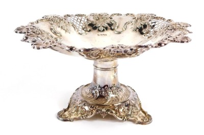 A Victorian silver comport, with hatched and embossed decoration of shells, flowers and rococo scrolls, on a tripod base, Fenton Brothers Ltd, Sheffield 1901, 14¼oz, 13cm high. - 5