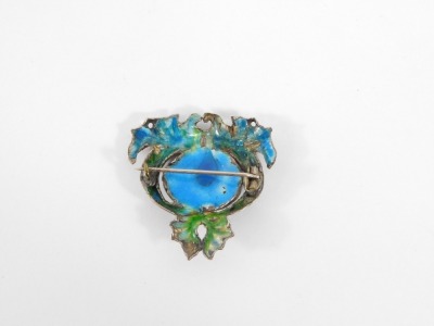 An Art Nouveau enamel pendant/brooch, depicting two fish type figures, with green and blue enamel works, on a single pin back with blister pearl centre, white metal unmarked, 3.5cm high, 9.9g all in. - 4