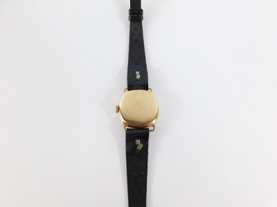 A Rotary 9ct gold lady's wristwatch, with square watch head and circular dial with seconds dial and silvered chequed backing, 2cm wide, on a black leather strap, 13g all in. - 6