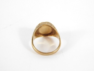 A 9ct gold signet ring, the oval central panel with bark effect detailing on rushed design shoulders, maker HS Limited, Birmingham 1970, ring size T, 8.1g all in. - 7