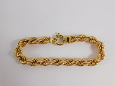 A fancy link bracelet, with layered brushed and plain links, with large circular clasp, yellow metal, marked 750, 19cm long, 18.3g all in. - 6