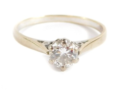 An 18ct white gold diamond solitaire ring, with round brilliant cut diamond approx 0.30cts, in six claw setting, with pierced sides, ring size N, 2.4g all in. - 4