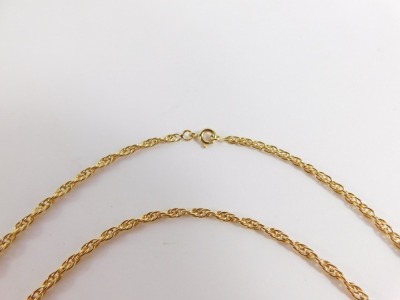 A fancy link neck chain, with inter linked links, yellow metal, marked 750, 60cm long, 12.5g. - 5