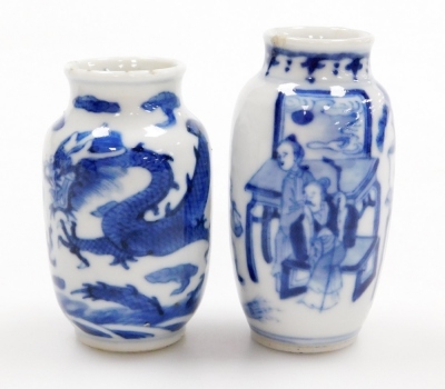 Three Chinese blue and white cylindrical porcelain snuff bottles, decorated with dragons, figures in a landscape, another of meiping form decorated with horses, and two further miniature blue and white vases; various Yongzheng and Qianlong marks to the un - 23