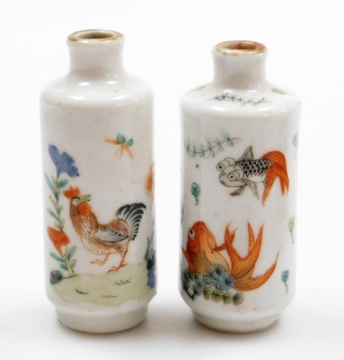 Two Chinese porcelain snuff bottles, decorated with Shubunkin and cockerels, 7.7cm and 8cm high, a small Chinese doucai bowl decorated with grasshoppers and flowers, 8cm high, a glass scent bottle and a small blue and white vase. (5) - 20