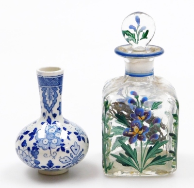 Two Chinese porcelain snuff bottles, decorated with Shubunkin and cockerels, 7.7cm and 8cm high, a small Chinese doucai bowl decorated with grasshoppers and flowers, 8cm high, a glass scent bottle and a small blue and white vase. (5) - 31