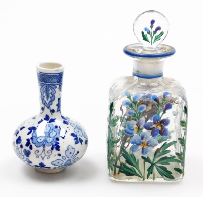 Two Chinese porcelain snuff bottles, decorated with Shubunkin and cockerels, 7.7cm and 8cm high, a small Chinese doucai bowl decorated with grasshoppers and flowers, 8cm high, a glass scent bottle and a small blue and white vase. (5) - 33