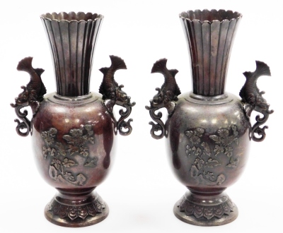 A pair of Meiji period Chinese bronze vases, with flared fluted necks and flowering branch and bird decoration in relief, fish handles and lappet decoration to the foot, 27.5cm high. - 9