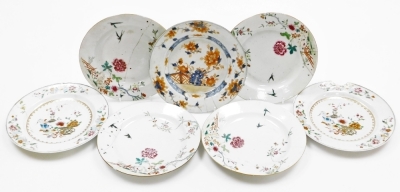 A collection of 18th Chinese plates, including four matching famille rose with chrysanthemum and swallow decoration, 23cm diameter, a pair with flowers and vases, 23cm diameter, and a Chinese Imari plate, 22.8cm diameter. (AF) - 18
