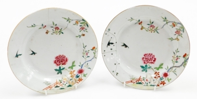 A collection of 18th Chinese plates, including four matching famille rose with chrysanthemum and swallow decoration, 23cm diameter, a pair with flowers and vases, 23cm diameter, and a Chinese Imari plate, 22.8cm diameter. (AF) - 25