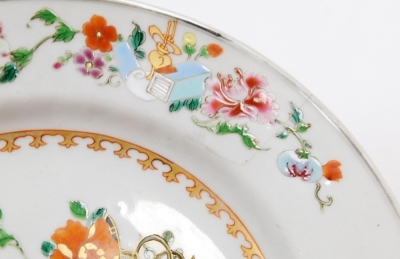 A collection of 18th Chinese plates, including four matching famille rose with chrysanthemum and swallow decoration, 23cm diameter, a pair with flowers and vases, 23cm diameter, and a Chinese Imari plate, 22.8cm diameter. (AF) - 32