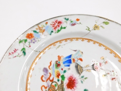 A collection of 18th Chinese plates, including four matching famille rose with chrysanthemum and swallow decoration, 23cm diameter, a pair with flowers and vases, 23cm diameter, and a Chinese Imari plate, 22.8cm diameter. (AF) - 33