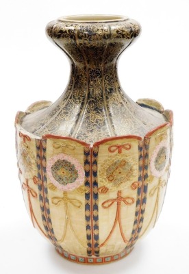 A Meiji period Japanese Satsuma vase, with tapered and inverted flared neck, in black with gilt foliate scroll decoration, the panelled body with intricate rosettes and ribbons, (AF), 42cm high. - 14