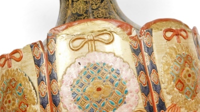 A Meiji period Japanese Satsuma vase, with tapered and inverted flared neck, in black with gilt foliate scroll decoration, the panelled body with intricate rosettes and ribbons, (AF), 42cm high. - 17