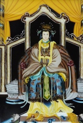 A 20thC Chinese ancestor portrait on glass, depicting a high ranking woman in a seated pose, with hardwood frame, 47cm x 30cm. - 6