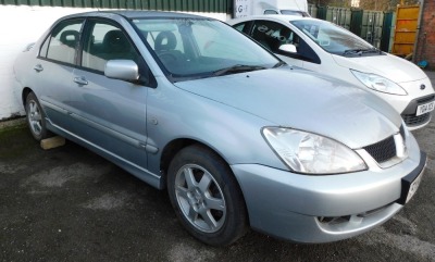 Mitsubishi Lancer Equippe, Registration FY55 GLV, petrol, 1584cc, four door saloon, silver, first registered 28/09/2005, V5 present, no keys present, vehicle is currently unlocked but is temperamental. To be sold upon instructions from the executors of P