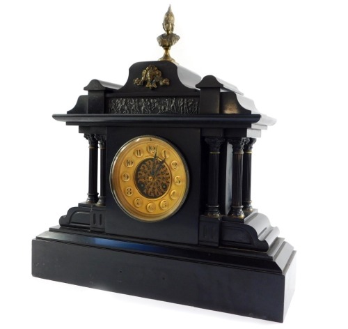 A late 19thC French slate and brass mantel clock, for Mappin & Webb, London, circular brass dial with central filigree scroll decoration, bearing Arabic numerals, eight day movement with coil strike, the case of architectural temple form with decorative f