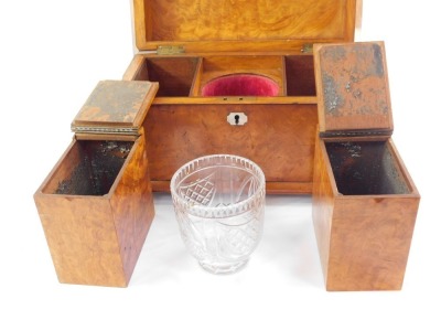A Regency satinwood sarcophagus tea caddy, the hinged lid opening to reveal a pair of tea boxes, flanking a mixing bowl recess, with a cut glass mixing bowl, the box with mother of pearl key escutcheon, raised on bun feet, 23cm high, 39cm wide, 24cm deep. - 2