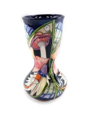 A Moorcroft pottery vase, c2010 designed by Vicky Lovatt, limited edition 19/50, of waisted form, decorated with wild mushrooms, painted and impressed marks, 18cm high.