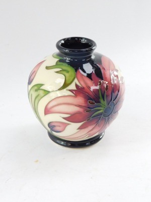 A Moorcroft pottery vase, designed by Rachel Bishop, limited edition 4/30, c2009, decorated with flowers against a cream ground, impressed and painted marks, 11cm high. - 3