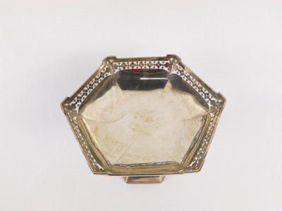 A George V pierced silver comport, the hexagonal top with raised and pierced shield border, on tapered base, Walker & Hall, Sheffield 1917, 20¼oz. - 2