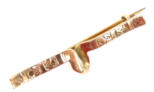 A 9ct gold loop twist bar brooch, with floral engraving,