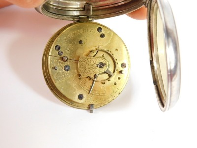 A Victorian gentleman's silver cased pocket watch, Sambrooks of Sheffield, open faced, key wind, white enamel dial bearing Roman numerals, subsidiary seconds dial, the case with engraved shield and garter reserve, with key, Birmingham 1896, and two associ - 8