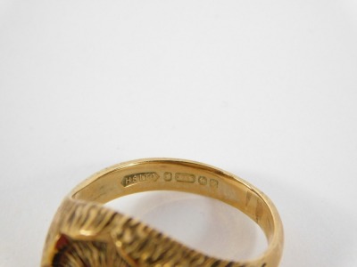 A 9ct gold signet ring, the oval central panel with bark effect detailing on rushed design shoulders, maker HS Limited, Birmingham 1970, ring size T, 8.1g all in. - 4