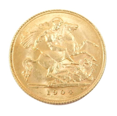 An Edwardian half gold sovereign, dated 1904.