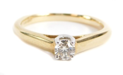 A 9ct gold diamond solitaire ring, with round brilliant cut diamond approx 0.25cts, in four claw raised basket setting with V splayed shoulders, ring size N, 2.7g all in. Note: VAT is payable on the hammer price of this lot.