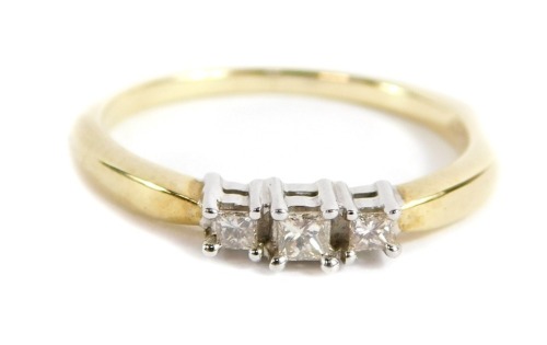 A 9ct gold diamond trilogy ring, with three ascher cut diamonds totalling approx 0.15cts, in four claw setting, ring size N, 2.2g all in. Note: VAT is payable on the hammer price of this lot.