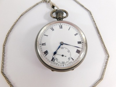 A George V silver gentleman's pocket watch, open faced, keyless wind, white enamel dial bearing Roman numerals, subsidiary seconds dial, blue hands, the case with engine turned decoration, shield and garter reserve, Birmingham 1930, on a silver plated wat - 2