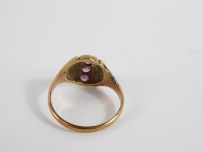 A Victorian dress ring, the central circular panel with three amethysts, and outer rows of three seed pearls (2 missing), on a rose gold coloured band, unmarked, ring size O, 3.2g all in. - 2