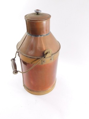 An early 20thC copper and brass bound milk churn, 42cm high. - 3