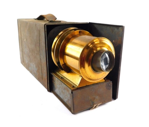 A Victorian tin plate and brass magic lantern, patent no. 2459, with a 6 inch lens, cased.