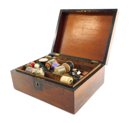 A Victorian walnut and ebony sewing box, with brass escutcheon and rectangular vacant plate to the lid, opening to reveal a tray top, 12cm x 30cm x 24cm.