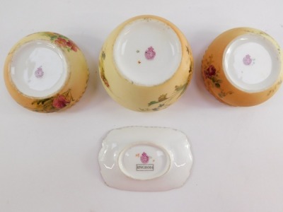 A Royal Worcester blush porcelain part dressing table set, c1911, painted with meadow flowers, printed marks, comprising three circular jars and covers and a pin dish. (4, AF) - 3