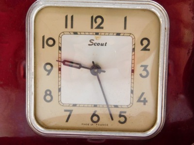 A French mid pottery mantel clock, scout square dial bearing Arabic numerals, clockwork movement, the square clock case flanked by a pair of squirrels, raised on a rectangular base, 38cm wide. - 2