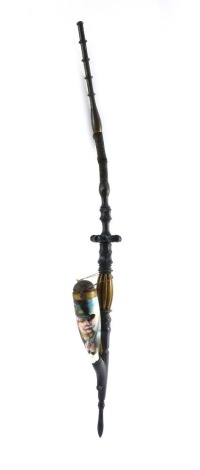 A Tyrolean late 19thC horn and porcelain pipe, painted with the figure of a hunter, 63cm wide.