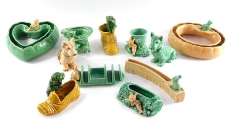 A group of Sylvac pottery, green and light brown, to include dogs and pixies, planters and a toast rack. (a quantity)
