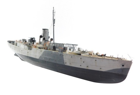 A kit built minelayer model, painted in grey and black camouflage, some loose items, 82cm long.