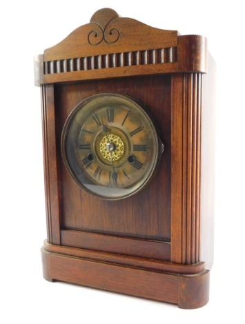 A 19thC mahogany cased mantel clock, Hamburg America Clock Co, the faux tortoiseshell dial with brass chapter ring bearing Roman numerals, eight day movement with coil strike, the case of architectural form, with key, 35cm high, 23cm wide, 14cm deep.