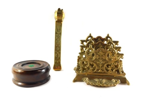 A late 19thC brass two tier latter rack, a Chinese brass scribe's case with floral engraving, and an oak gavel block. (3)