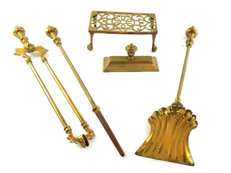 A set of three Victorian brass fire irons, comprising tongs, shovel and poker, and a trivet, etc.